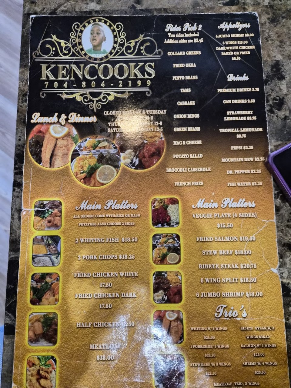 Printed menu showing lunch, dinner, and dessert options.